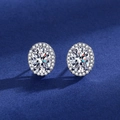 Oval cut faux moissanite halo stud earrings with silver finish on blue fabric - Led-69 Pigeon Egg Small Earrings