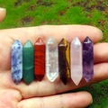 Handheld set of seven polished natural crystal hexagonal pillars in varied colors - 7Pcs Hexagonal Pillars Set