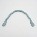 Detail shot of light blue thickened leather handbag handle with stitching for DIY replacement - Blue
