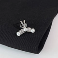 Elegante polsino per orecchio in argento con perle e zirconi alternati su tessuto scuro - Argento