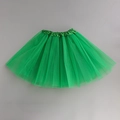 Detailed view of the layered green tulle fabric and satin waistband of the tutu skirt - Grass Green / Length 40cm