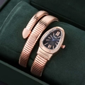 Detail of rose gold snake-shaped watch with crystal bezel in a luxury velvet box - Rose Gold Black Face