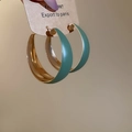 Detail of gold hoops with matte blue enamel finish held on a minimalist card - Silver Earring Post-Green