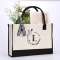 Beige katoenen canvas draagtas met zwarte bies en Summer Vibe bloemenprint ontwerp - Letter-L
