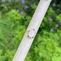 Detail view of 18K gold plated ring with Mother of Pearl carving and colorful zircon stones - Colorful