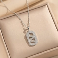Elegante collar con colgante de serpiente chapado en oro y circonitas brillantes - Plateado
