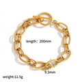 Detail view of 9.3mm wide gold stainless steel chain bracelet with OT toggle clasp - Gold Twisted Texture OT Clasp Style (TB5135)