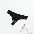 String en coton côtelé noir pour femme présenté sur fond blanc avec fleurs séchées - XXL(34) / Noir