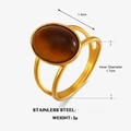 Gold stainless steel ring with a large oval brown resin stone and dual-band minimalist design - Inner Diameter 1.7cm / Brown