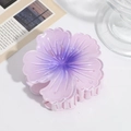 Macro detail of the purple gradient floral hair claw clip with glossy resin finish - Purple