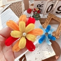 Handmade red and orange plush flower brooch with a central pearl in a cozy setting - Orange-Yellow Fireworks Fridge Magnet / One Size