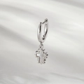 Silver cross earring variant with white mother of pearl inlay on grey wavy fabric - Shell Cross Style (A874-5)