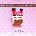 Detailed view of resin Santa in chimney DIY accessory for crafts, sized 1.7x2.5cm - Santa Climbing Chimney
