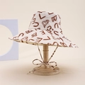 Beige wide brim sun hat with brown heart patterns and adjustable windproof strap - Letter Style / Khaki