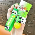 Cute panda light-up keychain featuring a yellow LED bulb and green silicone hand strap. - Panda Letter Light Bulb Charm / Green