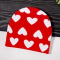 Berretto in maglia rossa con motivi a cuore bianchi per uomo e donna per l'inverno - Taglia unica / Rosso