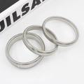 Detailed view of three stackable silver elastic stretch bracelets on white surface - 8mm Width/18cm Circumference / Silver