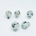 Mini mushroom crystal ornament in green and white stone with black spots, 2cm size - Tianshan Blue