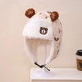 Detail of children's beige winter trapper hat featuring bear embroidery and soft faux fur lining - Kids approx 3-10 years / Light Beige
