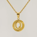 18K gold plated titanium necklace featuring letter Q pendant with sunburst texture - Letter Q