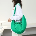 Minimalist bright green crescent nylon crossbody bag with silver zipper closure - Green