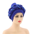 Close-up of royal blue turban hat featuring shiny sequin braided decorative band - Blue with Blue