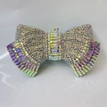 Clutch a fiocco con strass e cristalli colorati e montatura in metallo per la sera - Oro AB
