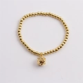 Gold plated bead stretch bracelet with a creative 20-sided dice pendant charm - Gold Copper Beads