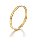 Minimalist gold-plated women's ring with sparkling crystals on white background - Gold