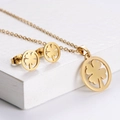 Golden titanium steel jewelry set featuring hollow clover pendant necklace and earrings - Four-leaf Clover Hollow