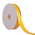 Roll of bright yellow satin ribbon on a white spool for gift wrapping and DIY crafts - Gold Yellow