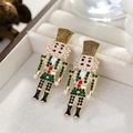 Nutcracker soldier earrings in gold finish with red and green rhinestones and pearls - Red Green Black Pearl