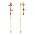 Detailed close-up of asymmetrical butterfly earrings with purple zircons and gold chain - Rose Red Zirconia