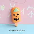 Macro shot of 1.5x3.3cm pumpkin popsicle resin flatback charm for DIY phone cases - Halloween Pumpkin Popsicle