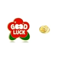 Flower-shaped 'GOOD LUCK' enamel pin badge in red and green with a gold butterfly clutch - Good Luck Flower