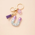Sparkly letter U keychain with purple sequins and a matching soft tassel charm - Letter U