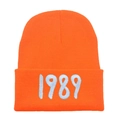 Orange 1989 embroidered knit beanie hat with ribbed texture for winter warmth - Adult (Stretchy) / Orange