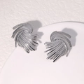 Vintage silver stainless steel stud earrings featuring irregular woven geometric design - Steel