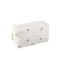 Quilted floral makeup bag in white with orange flower pattern and gold zipper detail - White Floral