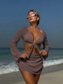 Detail of beach cover-up set featuring long-sleeve crop top and drawstring mesh skirt - S / Reddish Brown