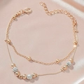 Detail of double-layer gold chain anklet with frosted beads and crystals on pink satin - KC Gold Frosted Rhinestone Ball Style (9695)