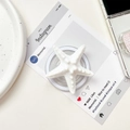 Close-up of white starfish phone griptok with textured resin detail on white background - Magnetic Stand / White