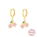 Macro shot of 925 sterling silver cherry earrings with pink and green gemstones - Gold-Cherry