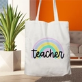 White canvas tote bag featuring a rainbow print and teacher lettering for gift - STD67-U (Handwritten Rainbow)