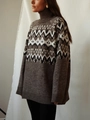 Women's loose Fair Isle knit sweater with colorful contrast patterns in a side view model shot - S / Dark Brown