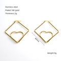 Detail view of 18K gold plated heart earrings in square hoops with 40mm dimension - Medium / Gold