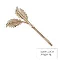 Minimalist golden leaf hair clip featuring a sleek metallic double-leaf design for styling - Style 10 Gold