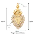 Macro view of gold-plated double heart pendant with cubic zirconia inlay and dimensions - Sacred Heart Crown / Gold