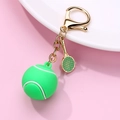 Portachiavi con mini pallina da tennis verde e racchetta dorata con chiusura a moschettone - Stile Tennis (067网球)