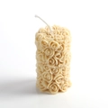 Creamy rose pillar candle with 3D floral carving and a cotton wick on white background - Yellow - Oud Wood
